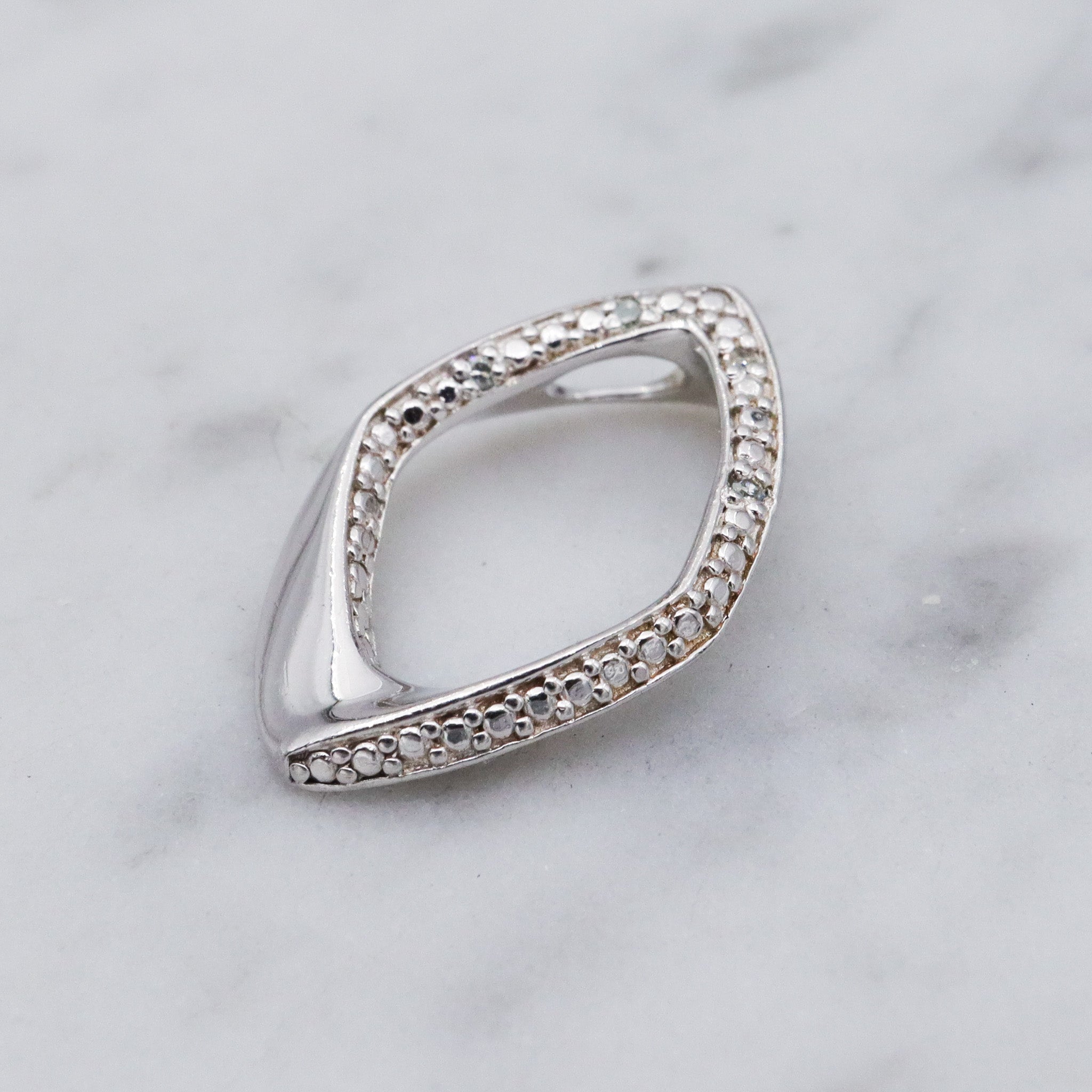 Vintage sterling silver and diamond abstract pendant